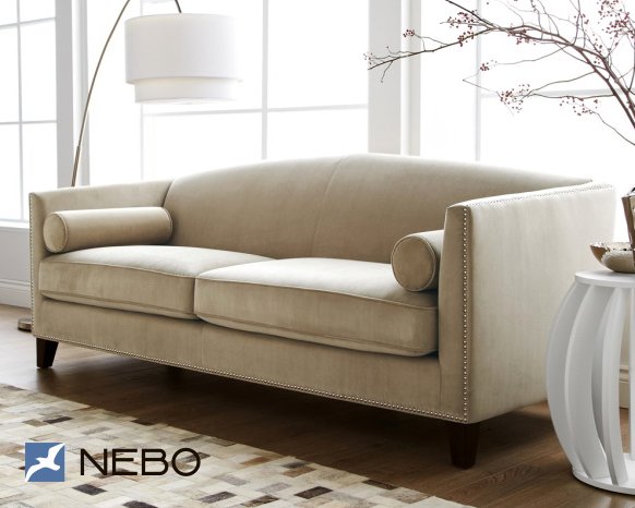 Бежевый прямой диван в классическом стиле с возможностью гостевой раскладки с декоративными гвоздями валиками