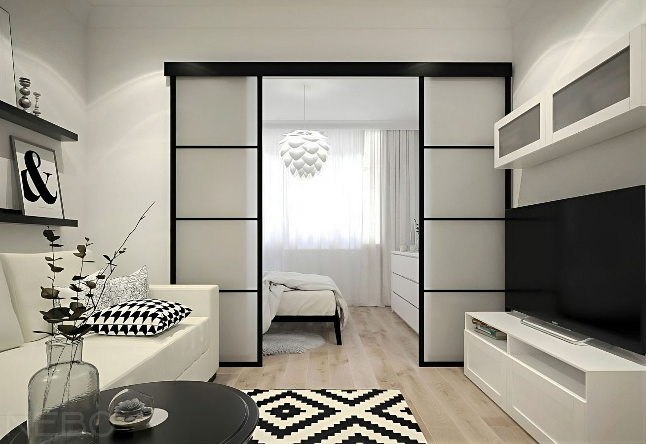 Раздвижные двери в черном профиле с матовым стеклом для зонирования спальни и гостиной