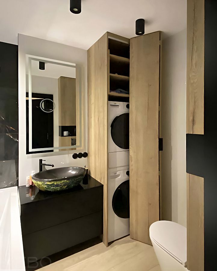 Шкаф-пенал для стиральной и сушильной машин со складной дверью и черная тумба под раковину