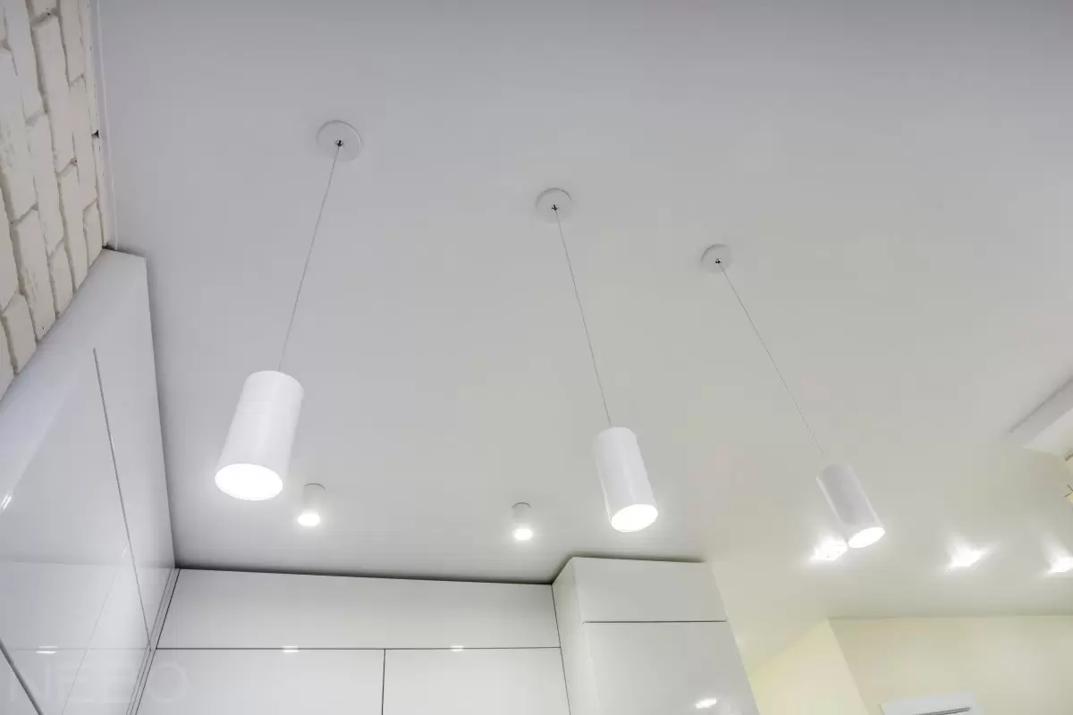 Стоимость установки светильников в натяжной потолок